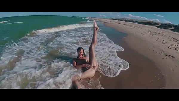 New ASS DRIVER XXX - Naked Russian nudist girl Sasha Bikeyeva on on the public beaches of Valencia warm Clips