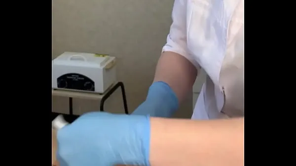 نئے The patient CUM powerfully during the examination procedure in the doctor's hands گرم کلپس
